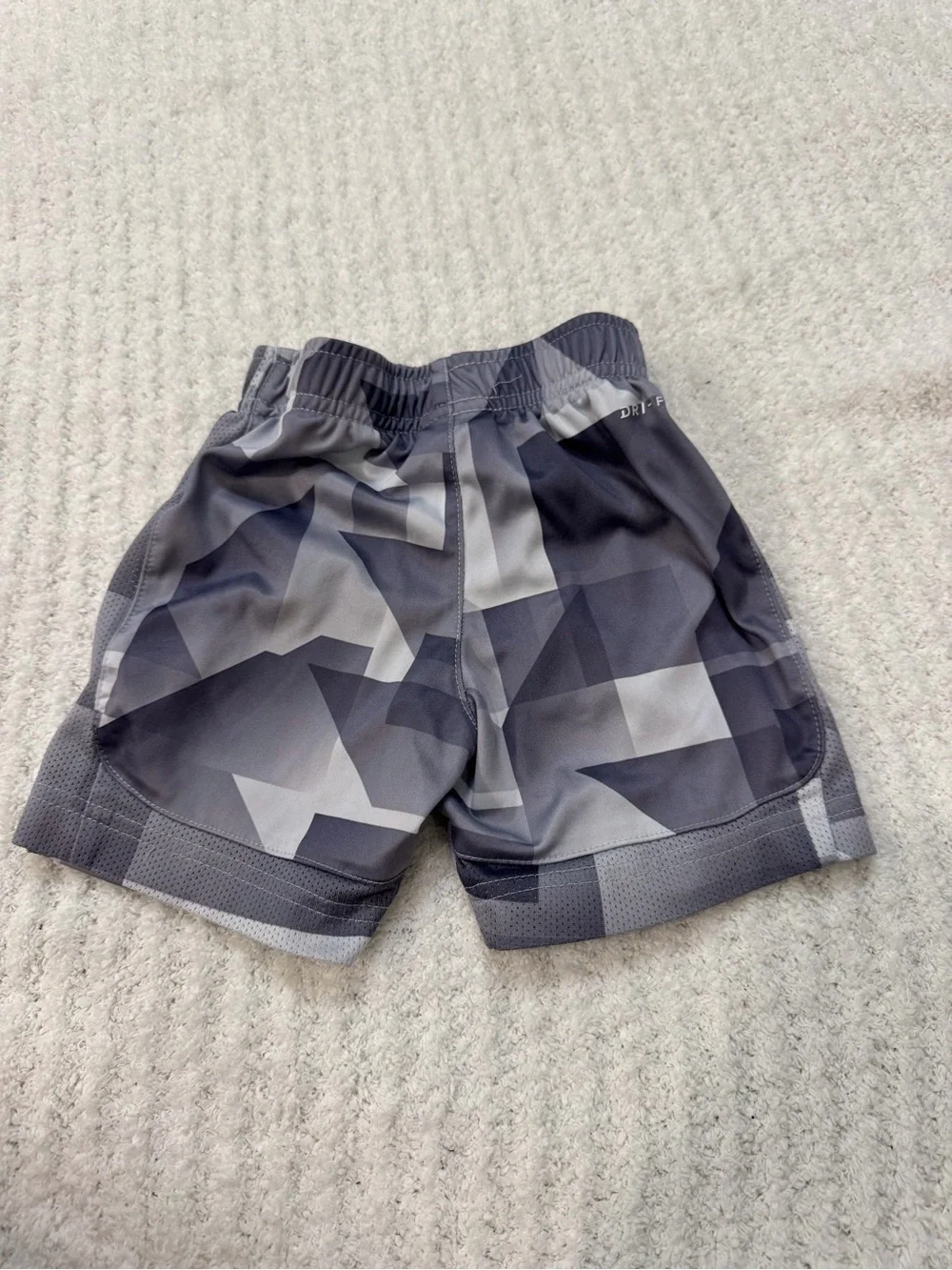 Nike Gray Geometric Print Kids Athletic Shorts with Yellow Swoosh